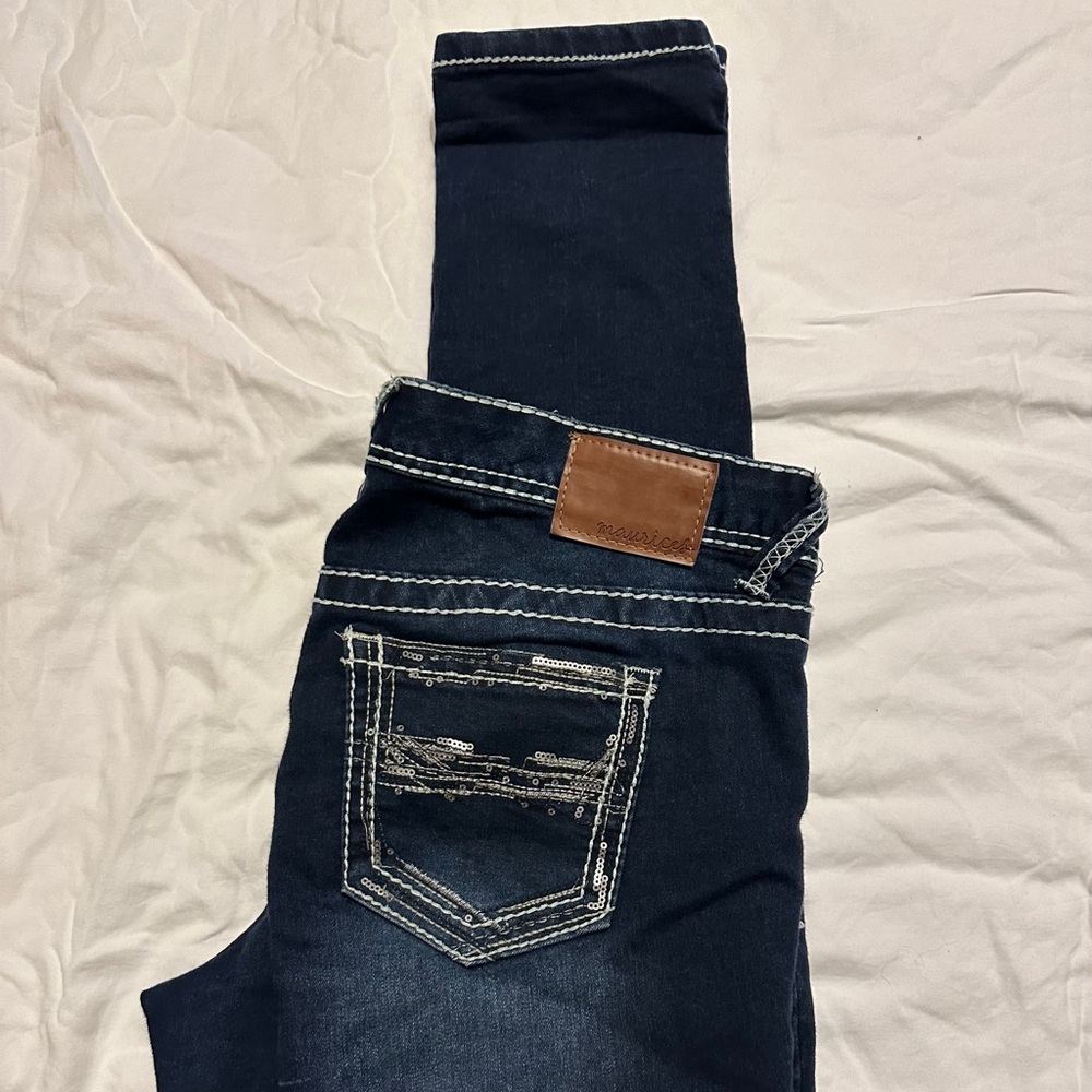 Maurice’s medium regular stretch skinny blue jeans.